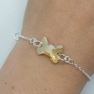 Strieborný náramok s ozdobou Swarovski mašľa zlatá Metallic Sunshine